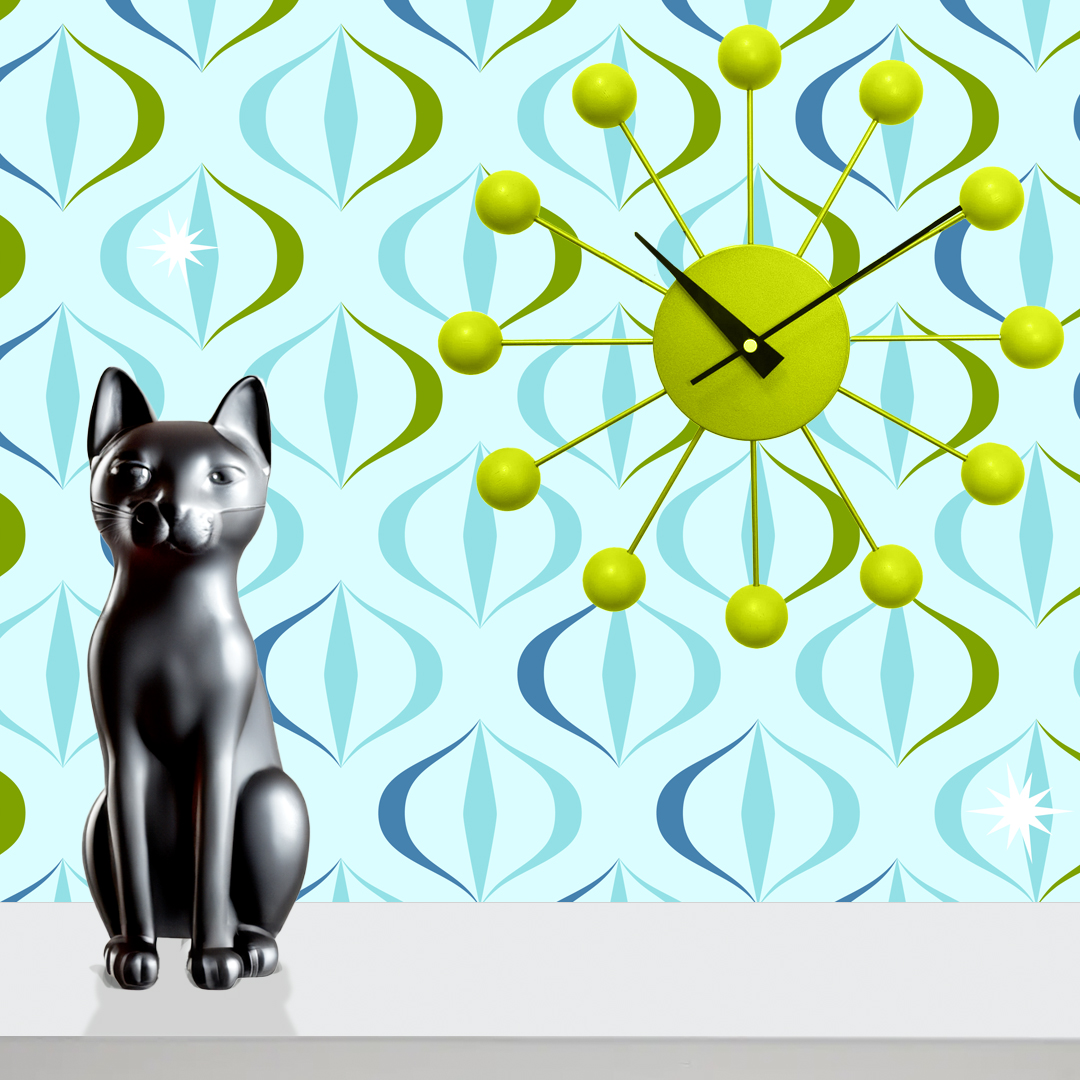 The artwork features a repeating geometric pattern of symmetrical shapes resembling elongated, curved diamonds or petals in various shades of blue and green. Each shape is split vertically with one half filled with a light blue and the other half filled with green or darker blue. The background is a light, almost pastel blue, which provides a soft yet vibrant backdrop. One of the blue shapes near the upper left contains a white starburst element, adding a focal point of brightness to the composition. The overall design conveys a modern, mid-century aesthetic with clean lines and harmonious color contrasts.